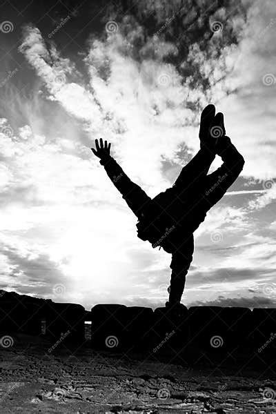 Silhouette Of Girl Doing A One Arm Handstand Stock Image Image Of