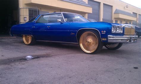 Photography By Miamiearl 75 Donk On 24 Gold Daytons Candy Blue At