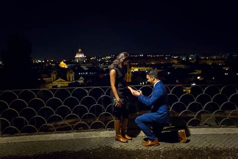 nighttime engagement photos surprise proposal in rome