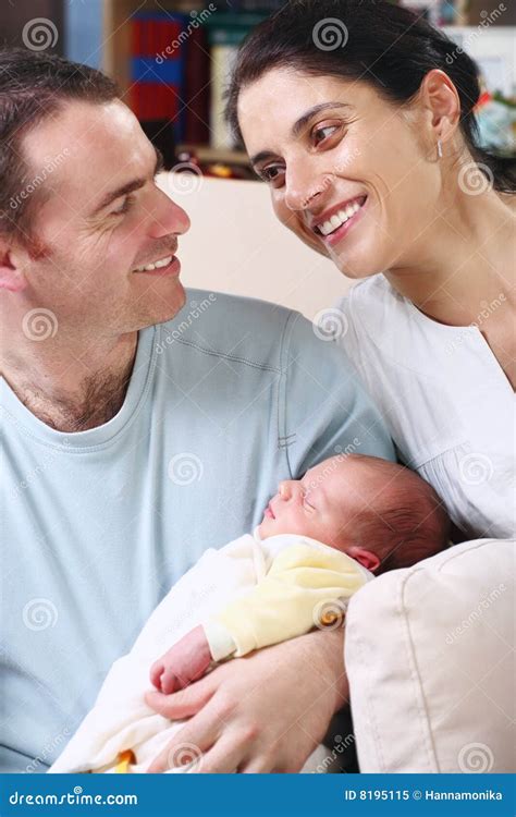 Happy Parents Holding Their Newborn Baby Stock Image Image Of Mother