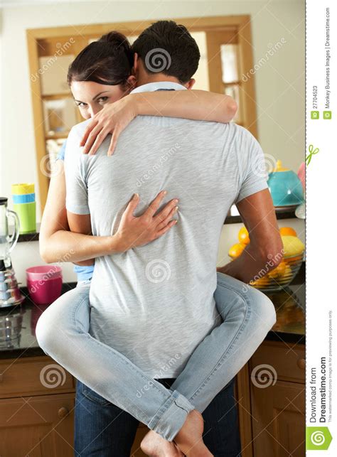 Romantic Couple Hugging In Kitchen Stock Image Image
