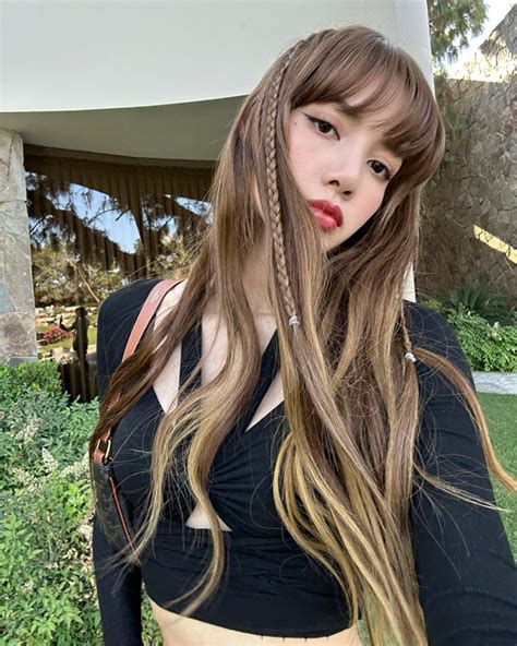 Blackpink S Lisa Displays Her Alluring Charm While Enjoying A Moment Of