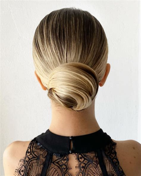 40 Beautiful Updo Hairstyles For 2022 Blonde Sleek Low Bun Hairstyle