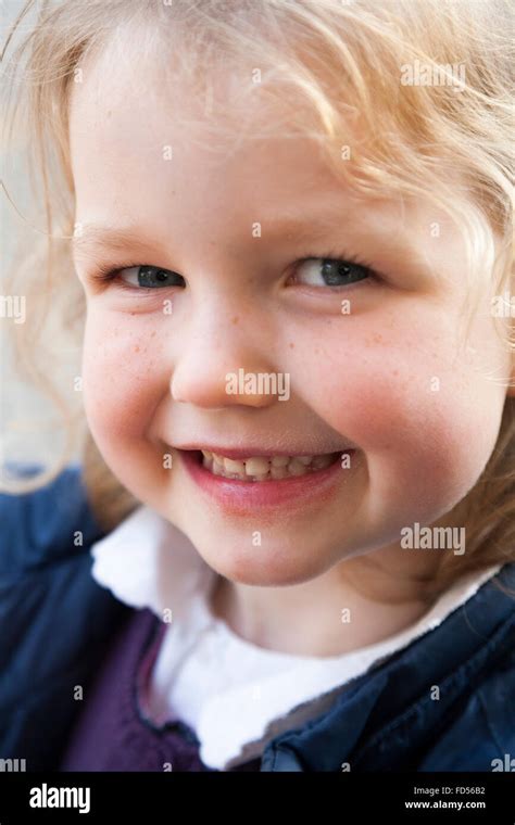 Face Portrait Of A Young Girl Age Aged 3 Three Year Old While She Is Smiling And Happy 78