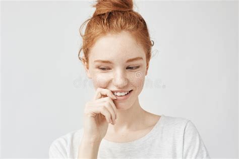 Portrait Of Appy Beautiful Redhead Girl With Freckles Smiling Sincerely Looking At Camera Not
