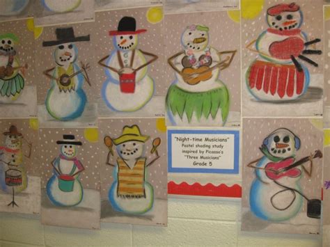 Several Snowmen Are Depicted On The Wall In This Classroom Setting