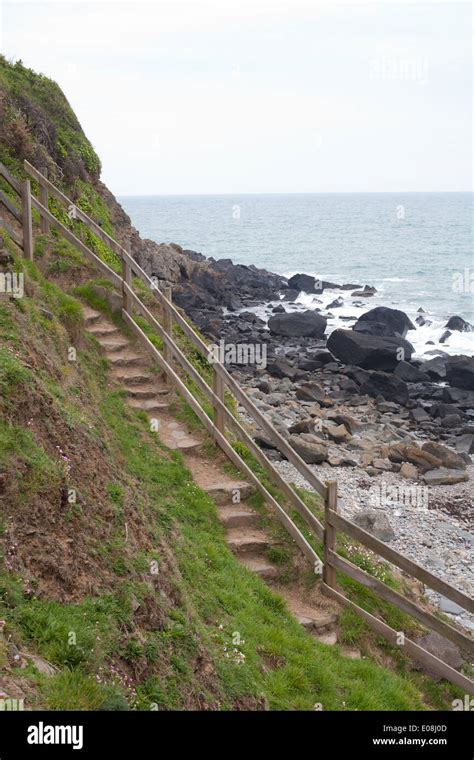 Steep Stairs Cut Into The Cliff Leading Down To The Beach Cove At