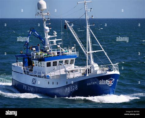Fishing Boat At Sea Stock Photo Alamy