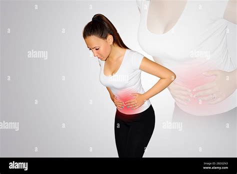 Abdominal Pain A Young Woman Suffers From Pain In The Abdomen The