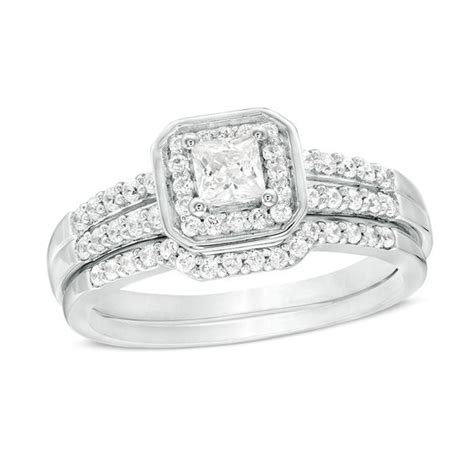 It's easy to understand why: 1/2 CT. T.W. Princess-Cut Diamond Cushion Frame Bridal Set ...