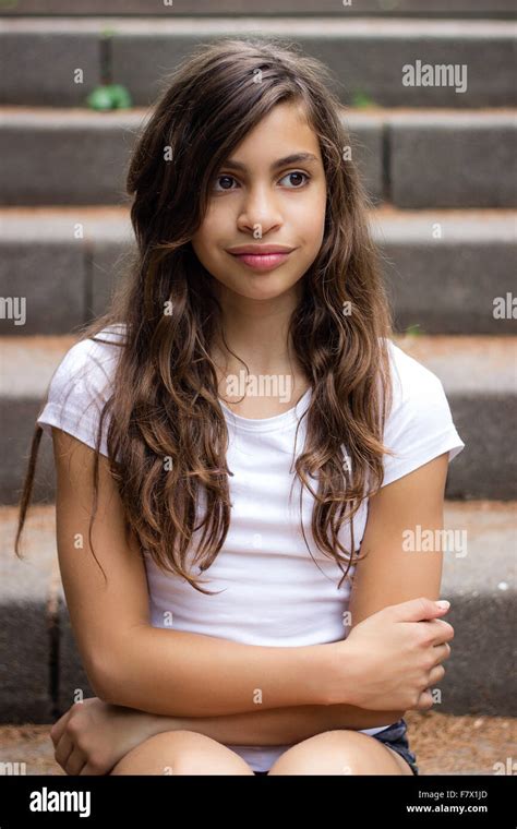 Portrait Of A Girl Sitting On Stairs Outside Stock Photo Alamy