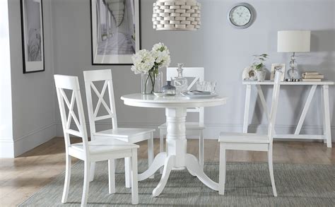 Shop for round dining room table sets at rooms to go. Kingston Round White Dining Table with 4 Kendal Chairs ...
