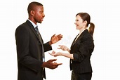 Two Business People Talking To Each Other Stock Photo - Image of ...