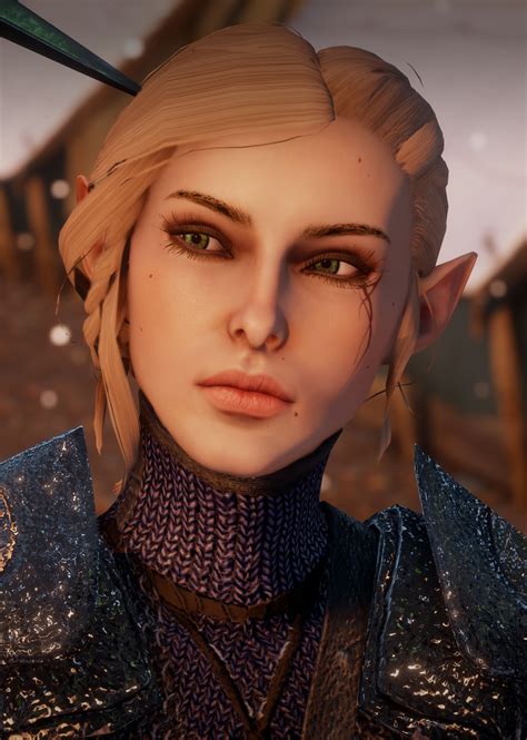 A Woman With Blonde Hair And Green Eyes In A Screenshot From The Elder