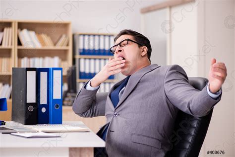 Tired Businessman Working In The Office Stock Photo 403676 Crushpixel