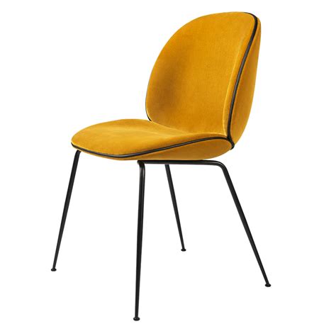 These stylish dining chairs are available in a wide variety of fabrics which can be paired with a frame that's either black or dining chairs like chloe manage to be both robust and slender. Beetle Fully Upholstered Dining Chair - Yellow Velvet ...