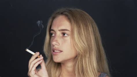 Slow Motion Shot Of Young Woman Smoking Cigarette Stock Video Footage