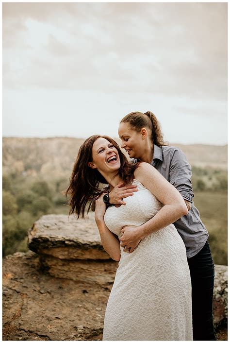 Kissing On Cliffs And Waterfall Frolics In This Epic Engagement Shoot Lesbian Photography