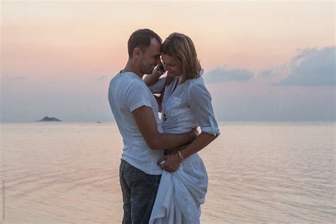 Couple Dancing At The Beach At Sunset By Stocksy Contributor Mosuno