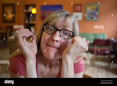 Woman With Pursed Lips Looking At The Camera Stock Photo Alamy