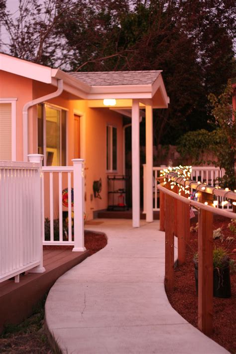 Lovely Walkway To A Pretty Backyard Cottage Lovely Lighting With New