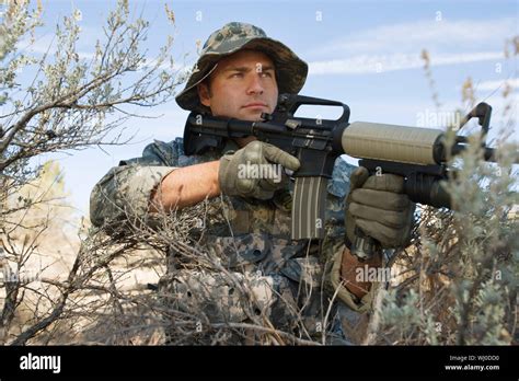 Soldier Aiming Machine Gun Close Up Stock Photo Alamy