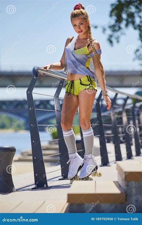 Happy Woman Posing In A Vintage Roller Skates T Shirt Shorts Posing
