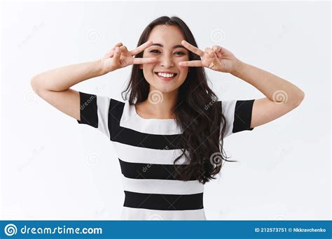 Cheerful And Outgoing East Asian Brunette Girl With Happy Smile