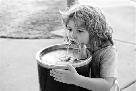 Refreshment Solution Thirsty Kid Drink Water From Drinking Fountain
