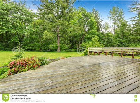 View Of Wooden Walkout Deck With Patio Area Stock Photo Image Of