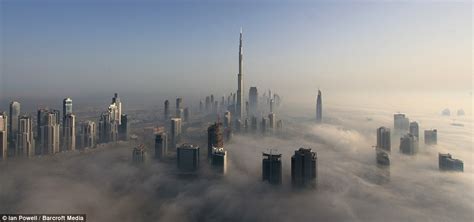 The City In The Clouds Dramatic Images Of Dubais Skyscrapers Poking