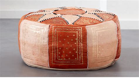 Scatter several of poufs on a floor around a low coffee table or by the fireplace. Moroccan Leather Pouf + Reviews | CB2
