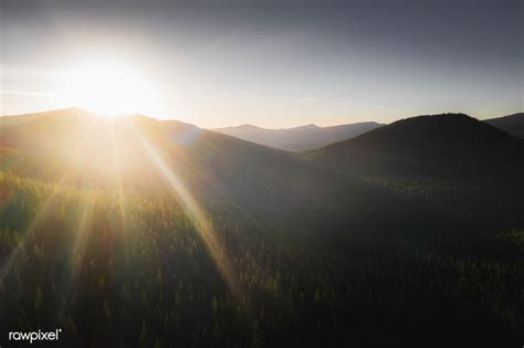 Sunbeam Over A Top Of Green Mountains Premium Image By