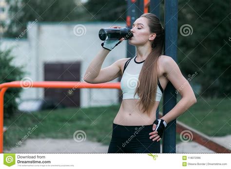 Sports bars near me accepts no liability for any loss, damage or inconvenience caused by reliance on any information in this system. Fitness Woman Drinking Water Outdoor Near Sport Bars Stock ...