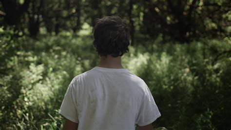 Young Man Teen Boy Walking Hiking Slow Motion Trees Woods