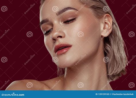 Young Appealing Blonde Haired Woman With Nice Hairstyle Stock Image