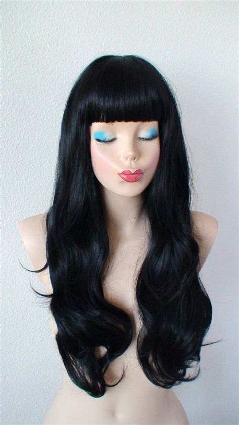 She had long hair and she was pretty. Black wig with bangs. Human hair likely synthetic wig ...