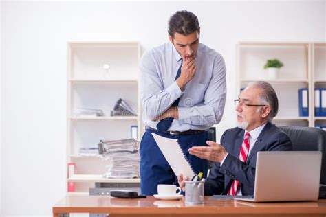 Old Boss And Young Male Employee In The Office Stock Image Image Of
