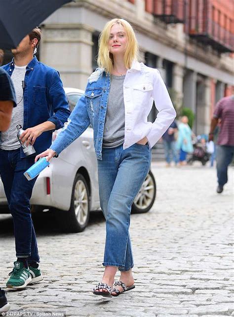 Elle Fanning Flashes Her Midriff While Posing Up A Storm In Manhattan