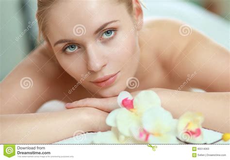 Beautiful Young Woman Getting Spa Massage Lying Stock Image Image Of Beauty Orchid 65514063