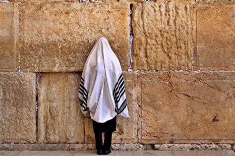 Reciting A Brief Prayer At The Wailing Wall In Jerusalem Israel