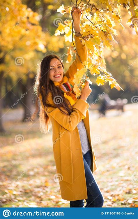 Beautiful Woman In The Autumn Park Stock Photo Image Of Beautiful