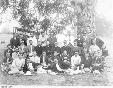 clergymen with a group of tennis players in south australia photograph state library of
