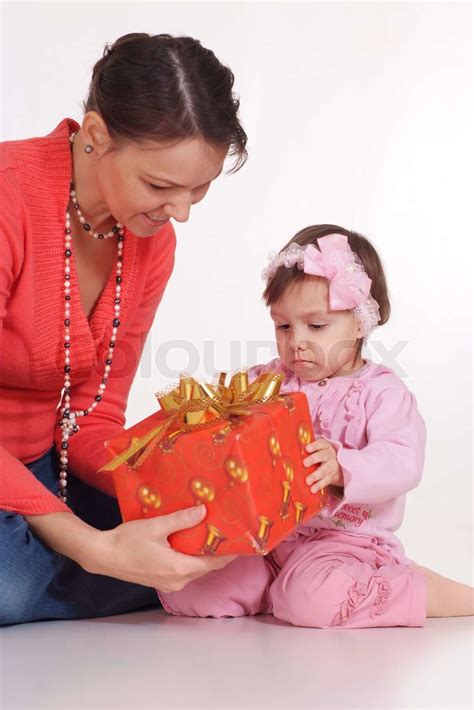 Mother Give Daughter Present Stock Image Colourbox