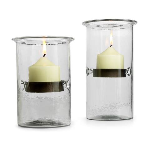 Hurricane Candle Holders Sleek And Functional Glass And Metal Cylinders Double As Vases
