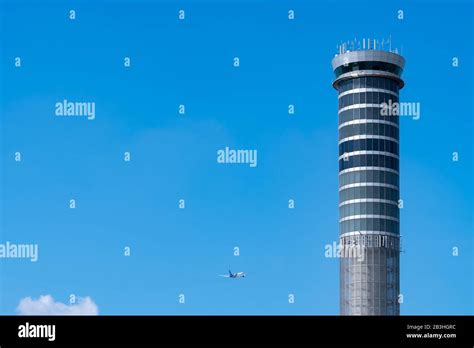 Air Traffic Control Tower In The Airport With International Flight