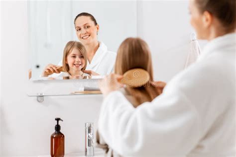 Mother And Daughter Brushing Hair At Bathroom Stock Image Image Of Hairbrush Morning 248975571