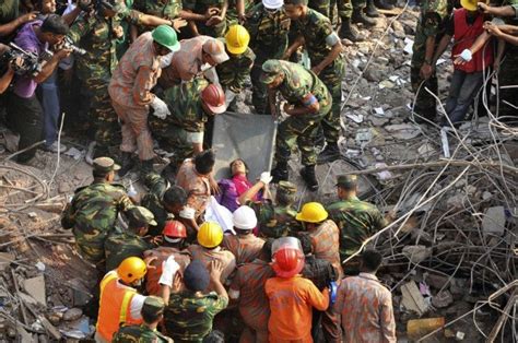 Incredible Rescue Workers Rescue A Woman From The Rubble Of The Collapsed Rana Plaza Building