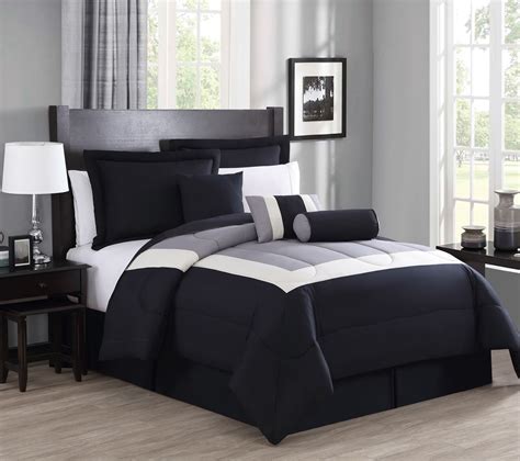 Coordinating shams match the comforter's color scheme. 7 Piece Rosslyn Black/Gray Comforter Set