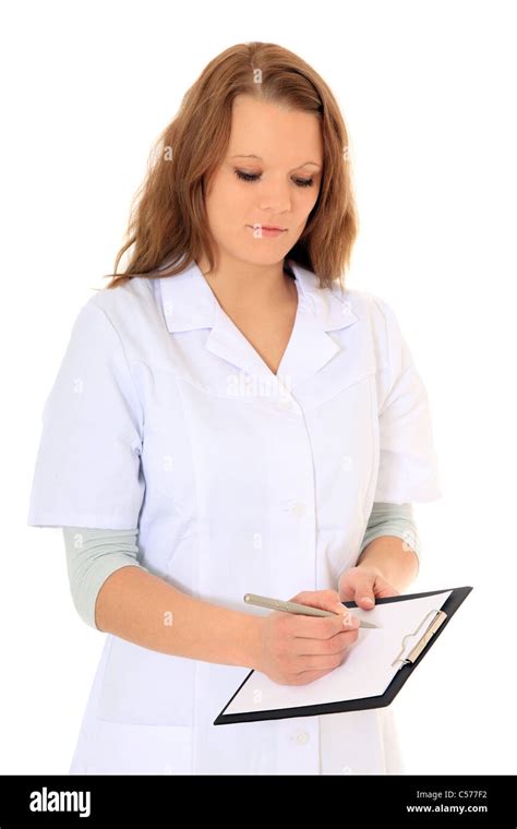 Nurse Writing On Clipboard All On White Background Stock Photo Alamy